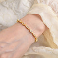 Baguette White Topaz Prong 14k Yellow Gold Plated Silver Link Bracelet by Fine Color Jewels
