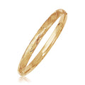 14k Yellow Gold Domed Bangle with a Weave Motif by Avera Group