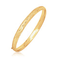 14k Yellow Gold Diamond Cut Design Dome Motif Children's Bangle by Avera Group
