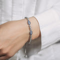 Sterling Silver Adjustable Enameled Evil Eye Bracelet with Cubic Zirconias (6.50 mm) by Avera Group