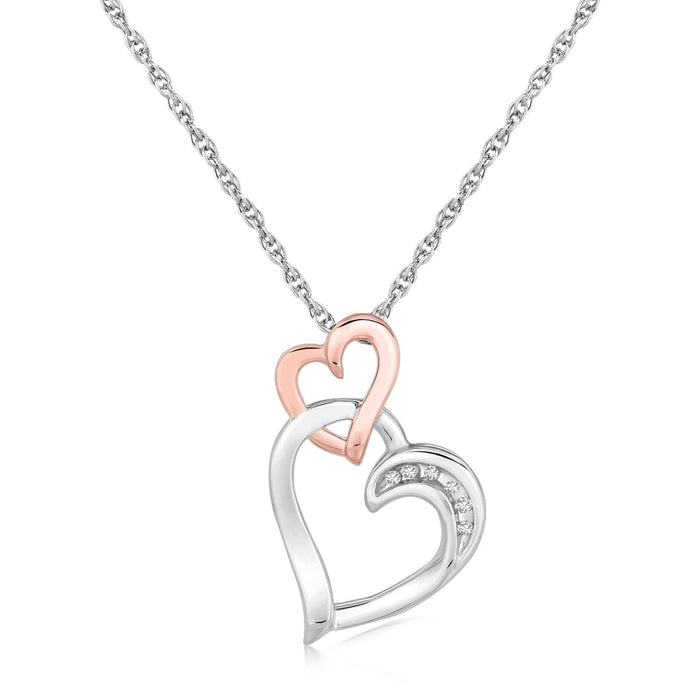 Sterling Silver Cascading Dual Heart Diamond Accented Pendant (.02 cttw) by Avera Group