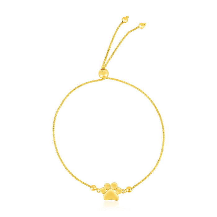 14k Yellow Gold Adjustable Paw Print Bracelet by Avera Group