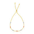 14k Tri-Color Gold Textured Oval Station Lariat Style Bracelet by Avera Group