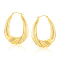 14k Yellow Gold Graduated Textured Oval Hoop Earrings by Avera Group