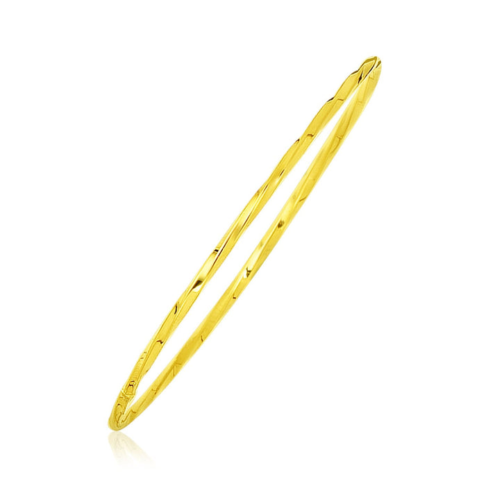 14k Yellow Gold Thin Twisted Shiny Bangle by Avera Group