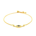 14k Yellow Gold Adjustable Evil Eye Bracelet by Avera Group