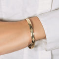 10k Yellow Gold Slender Diamond Pattern Textured Bangle by Avera Group