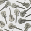 Guitar Divot Tool by Guerrilla Golf