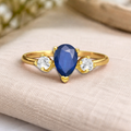 0.67 Ct Pear Blue Sapphire and White Sapphire Prong 22K Gold Vermeil Three Stone Ring by Fine Color Jewels