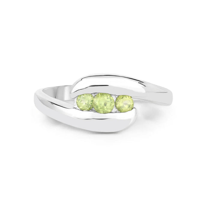 0.56 Ct Oval Green Peridot Channel Silver Three Stone Bypass Ring by Fine Color Jewels