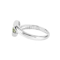 0.56 Ct Oval Green Peridot Channel Silver Three Stone Bypass Ring by Fine Color Jewels