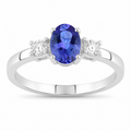 0.75 Ct Oval Violet Tanzanite and Lab Diamond Prong Silver Three Stone Ring by Fine Color Jewels