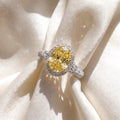 3Cttw Oval Shaped Yellow Lab Grown Diamond (F/VS) Three Stone Halo Enagement Ring 14K Gold by Fine Color Jewels