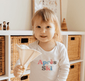 long sleeve graphic bodysuit | apres ski by Finn + Emma