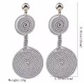 Spiral Wire Wrapping Double Circle Drop Earrings Earrings by Duma Mbili LLC
