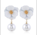 Flower Shaped Stud Earrings by Duma Mbili LLC