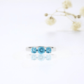 0.55 Ct Round Natural Blue Paraiba Apatite Prong Rhodium Silver Three Stone Ring by Fine Color Jewels