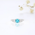 1.05 Ct Cushion Blue Natural Paraiba Apatite Prong Rhodium Plated Sterling Silver Baguette Accents Five Stone Ring by Fine Color Jewels
