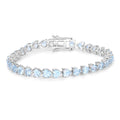 Heart Sky Blue Topaz Prong Silver Tennis Bracelet by Fine Color Jewels