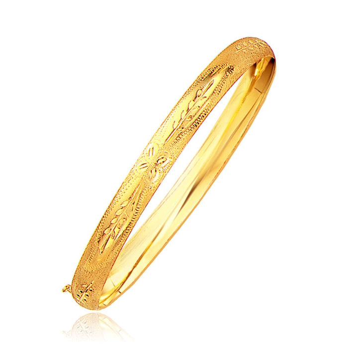 Classic Floral Carved Bangle in 14k Yellow Gold (6.0mm) by Bids.com
