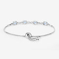Oval Blue Aquamarine Prong Two-Tone Gold Plated Silver Infinity Bolo Adjustable Bracelet by Fine Color Jewels