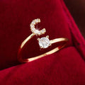Adjustable Copper Initial Ring with Four-Claw Round Zirconia by DailySale