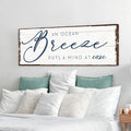 An Ocean Breeze Puts A Mind At Ease Sign by Tailored Canvases