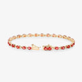 7.00 Ct Oval Orange Sapphire Prong 14K Yellow Gold Inline Tennis Bracelet by Fine Color Jewels