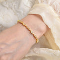 Baguette White Topaz Prong 14k Yellow Gold Plated Silver Link Bracelet by Fine Color Jewels