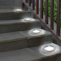 Bell + Howell Solar-Powered LED Garden Disk Lights Set by DailySale