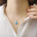 Blue Opal Oval Halo Necklace by Fine Color Jewels
