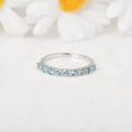 Blue Topaz Half Eternity Ring by Fine Color Jewels