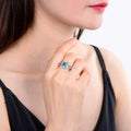 Blue Topaz Split Band Halo Ring by Fine Color Jewels