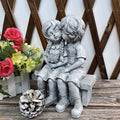 Boy Kissing Girl Statue Sitting on Bench Figurine by DailySale
