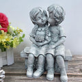 Boy Kissing Girl Statue Sitting on Bench Figurine by DailySale