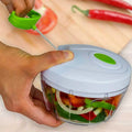Compact & Powerful Hand Held Vegetable and Fruit Chopper and Slicer by DailySale