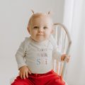 long sleeve graphic bodysuit | crawl walk ski by Finn + Emma