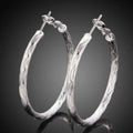Diamond Cut Hoop Earrings In White Gold by DailySale