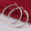 Diamond Cut Hoop Earrings In White Gold by DailySale