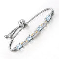 Oval Blue Aquamarine Prong Two-Tone Gold Plated Silver Infinity Bolo Adjustable Bracelet by Fine Color Jewels