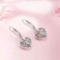 Exquisite Hollow Heart-Shaped Hoop Earrings by DailySale