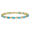 Genuine Swiss Blue Topaz 14K Gold Floral Bracelet by Fine Color Jewels
