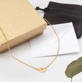 Gold Compass Necklace by Dear Ava