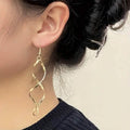 Spiral Design Dangle Earrings by DailySale
