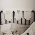 graphic bodysuit | loved rainbow heart by Finn + Emma