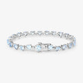 Heart Blue Topaz & Diamond Prong Silver Tennis Bracelet by Fine Color Jewels