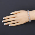 Heart Blue Topaz Prong Silver Tennis Bracelet by Fine Color Jewels