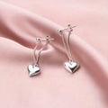 Heart-Shaped Dangle Earrings by DailySale