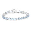Heart Sky Blue Topaz Prong Silver Tennis Bracelet by Fine Color Jewels