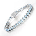 Heart Sky Blue Topaz Prong Silver Tennis Bracelet by Fine Color Jewels
